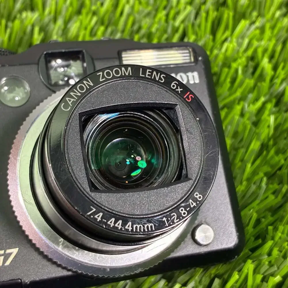 Canon PowerShot G7 10.0MP Digital Camera with Charger, Battery, and 4GB SD Card